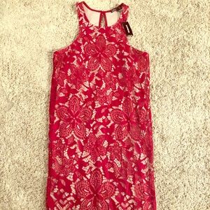 Red lace halter dress. With nude lining.
